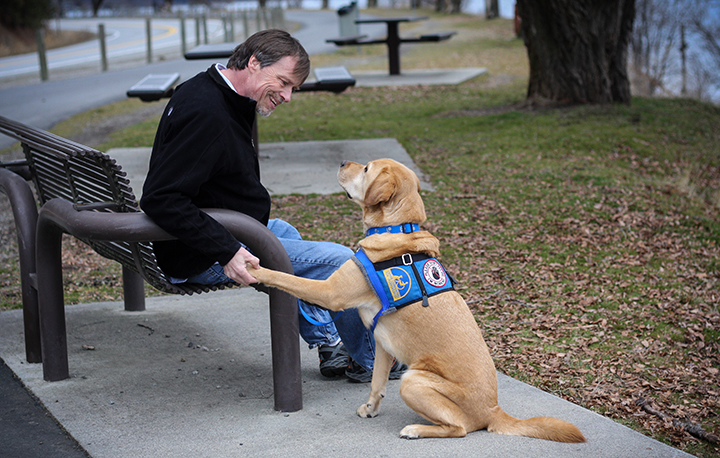 person with Canine Companions service dog