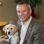 person with Canine Companions puppy