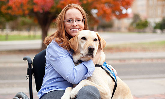 person with Canine Companions service dog
