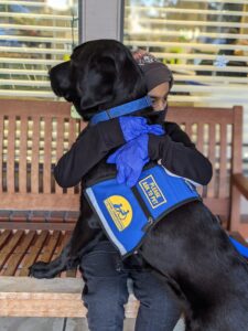 Facility Dog Rumba does a 